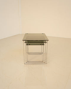 Chrome nesting tables and smoked glasses 70's