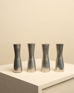 Set de quatre petits bougeoirs en métal chromé par Erika Pekkari 90's